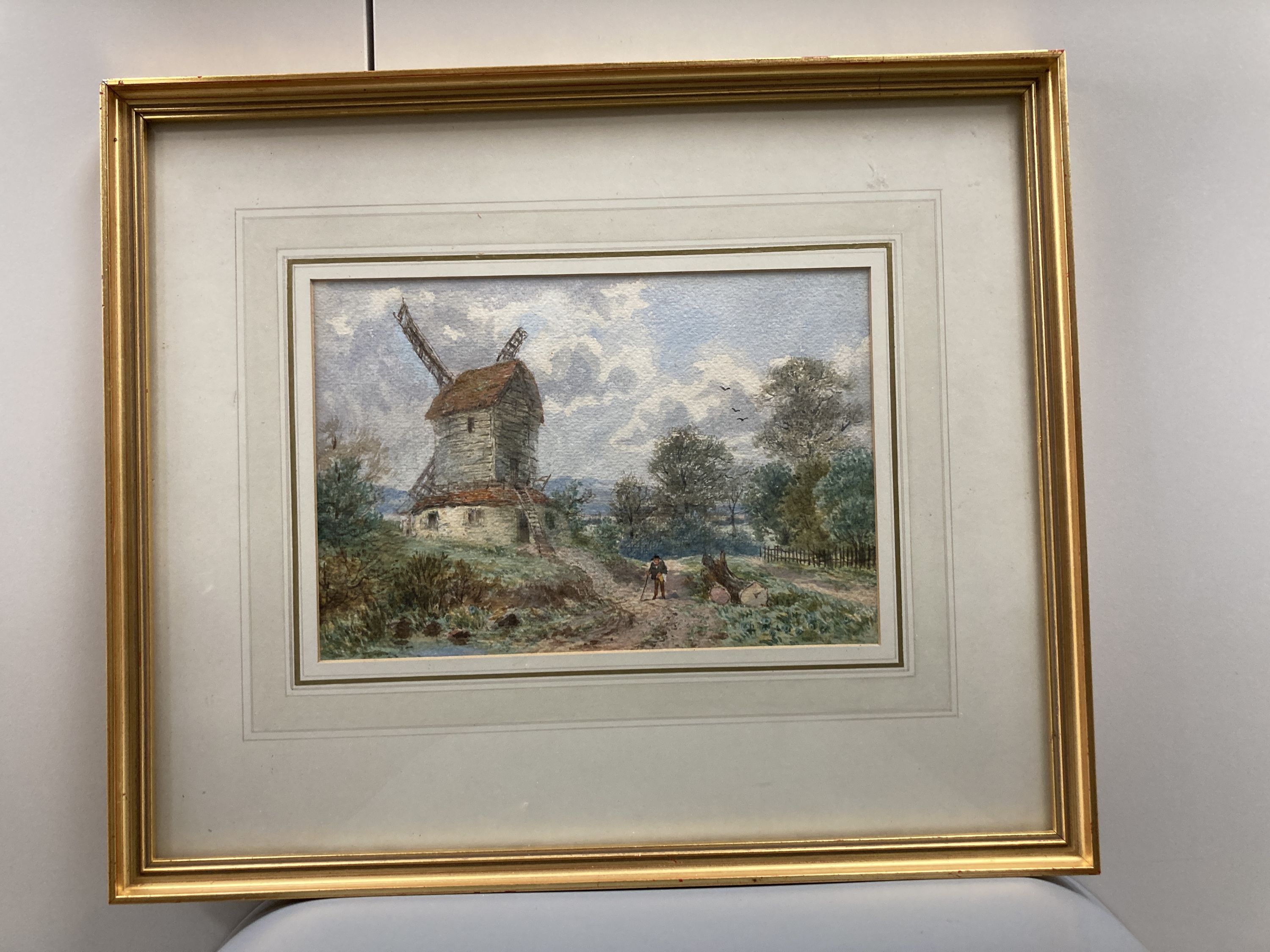 Late 19th century English School, watercolour, Traveller passing a windmill, 16.5 x 24cm